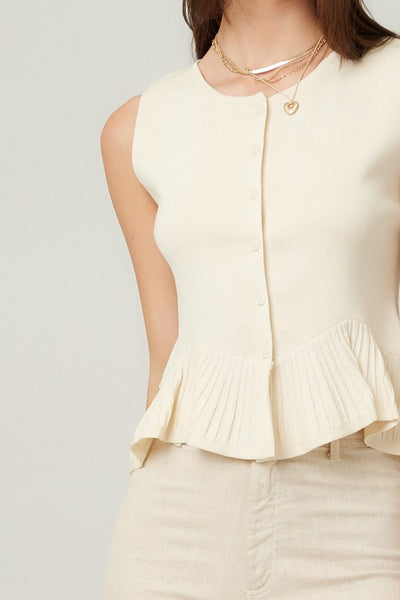 SLEEVELESS CREAM KNIT RUFFLE HEM CARDIGAN